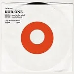 Kor-One - Sand In The Wind / Plastic Island : 7inch